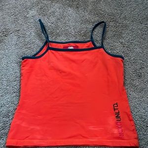 Has some bleach stains but is a good shirt otherwise